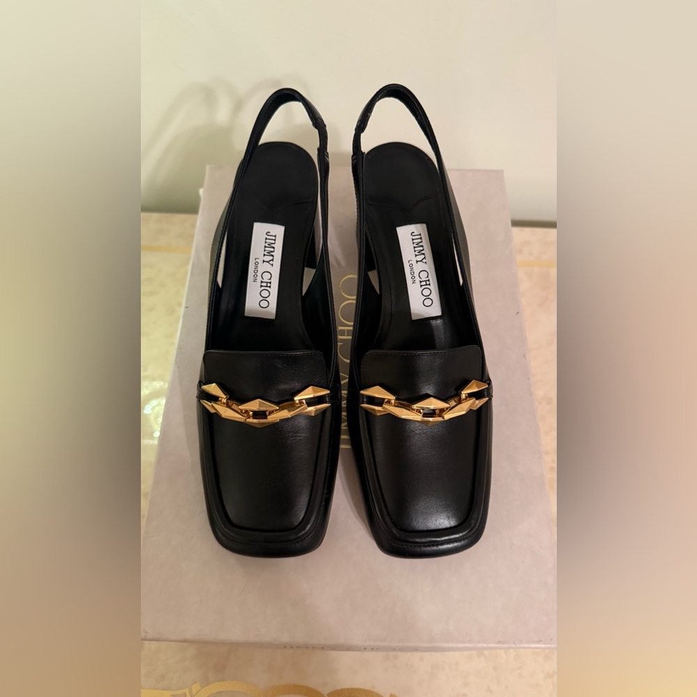 Jimmy Choo
Diamond Tilda Slingback Black and Gold Loafers new